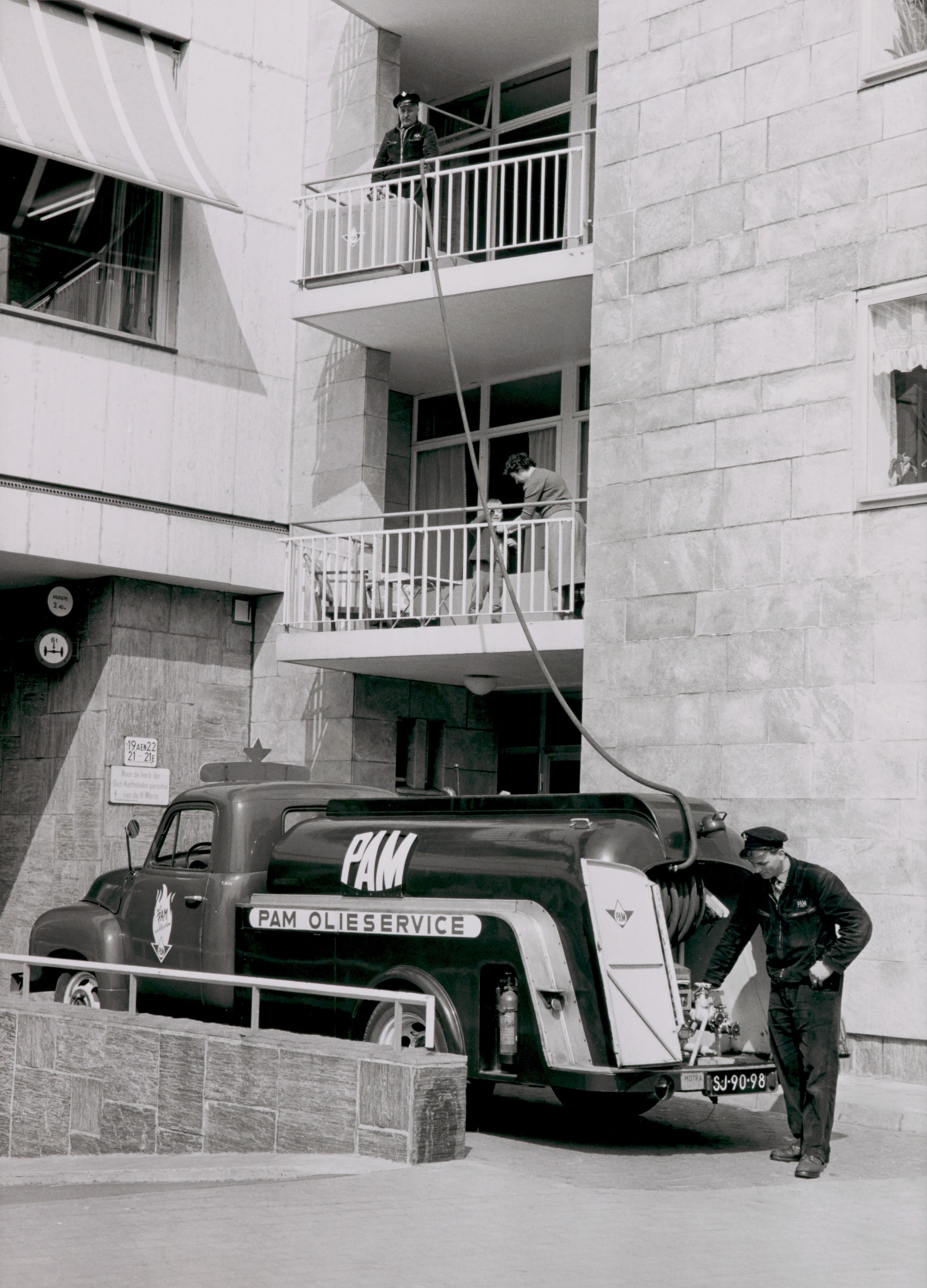 Pam Oil Service supplying oil to households around 1960.