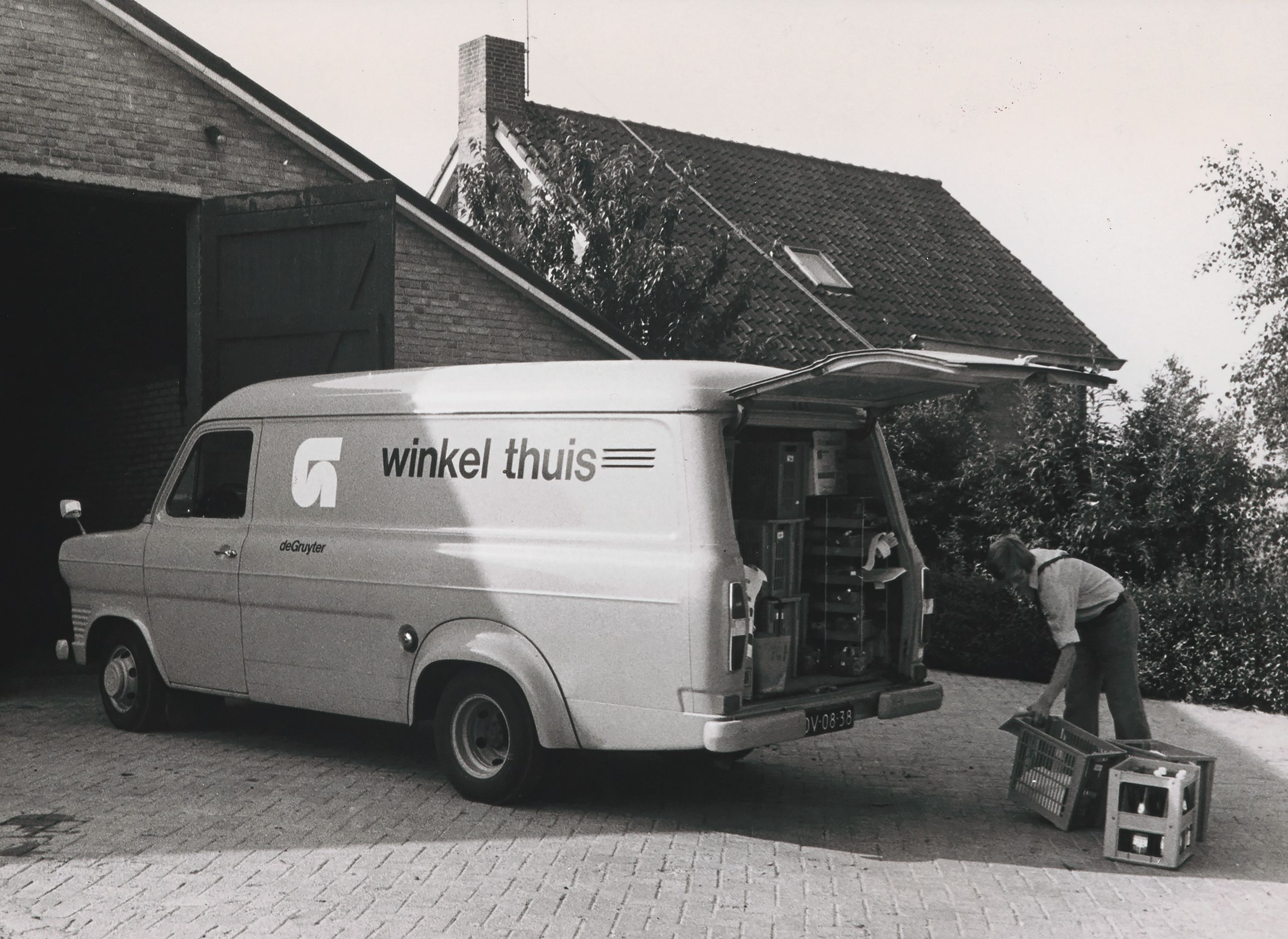 Supermarket subsidiary deGruyter delivers groceries to a home, c. 1973.