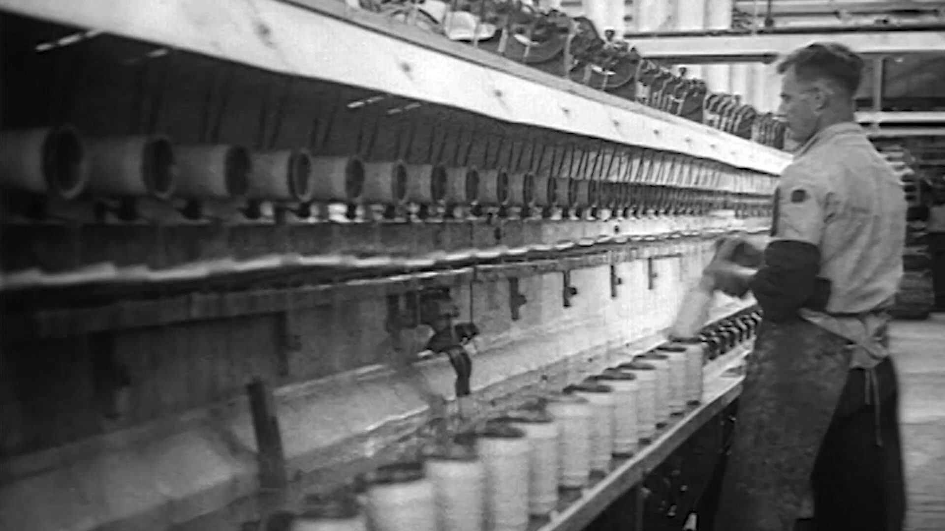 Employees at work in the ENKA rayon factory in Ede, The Netherlands in 1930.
