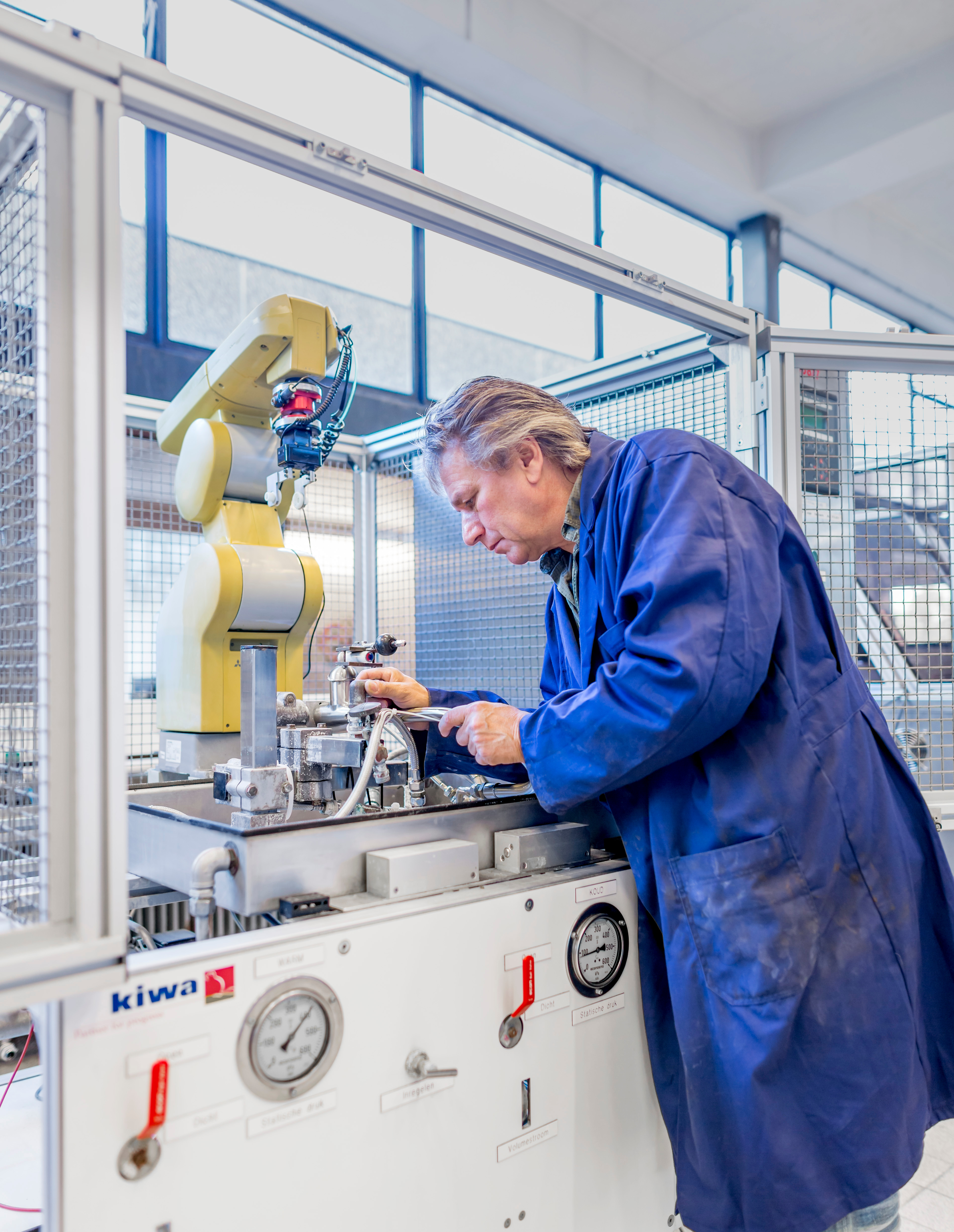 A Kiwa employee tests a drinking water tap, 2015.